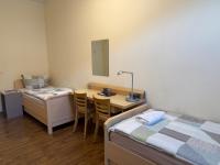 Camera Doppia con Letti Singoli e Bagno in Comune