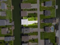 Texan Waterfront Retreat with Boat Slip, Fire Pit, Game Room and Outdoor Shower - B&B Galveston