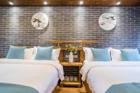 Camera Deluxe Doppia con Letti Singoli