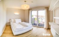 Suite-Apartment mit Balkon