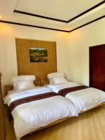 Camera Doppia con Letti Singoli con Vista Giardino