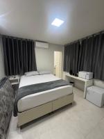 Loft 305B com Ar Condicionado no Bairro Muquiçaba, bem localizado para negócios e fácil acesso para todas as praias e montanhas da cidade - COM vaga de garagem - Bed and Breakfast Guarapari