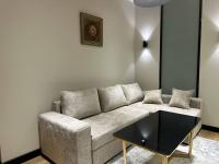 One-Bedroom Apartment with Balcony and City View