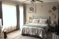 Kamer met Queensize Bed en Uitzicht op Zee