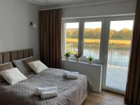 One-Bedroom Apartment with Balcony and Water View