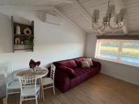 One-Bedroom Apartment with Balcony and Water View