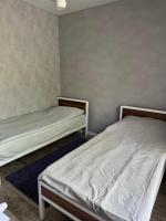 Tweepersoonskamer met 2 Aparte Bedden