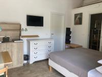 Deluxe Tweepersoonskamer met 1 of 2 Bedden en Uitzicht op de Tuin