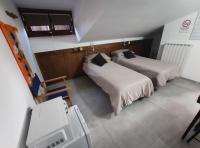 Camera Doppia con Letti Singoli