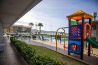 Condomínio Frente Mar com Piscina Climatizada - B&B Bombinhas