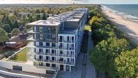 Pod Brzozami Apartamenty Perłowa Przystań - Bed and Breakfast Sianożęty