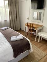 Chambre Double ou Lits Jumeaux Deluxe – Vue sur Jardin