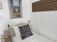 Camera Doppia con Letti Singoli e Bagno in Comune