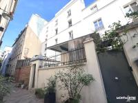 Montmartre vue sur les toits de Paris et la Tour Eiffel - Chambres d’hôtes Paris