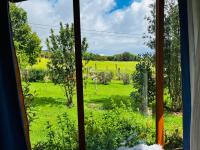 Casa con orilla de río y vista a los volcanes - Ferienwohnung Llanquihue