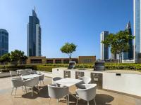 Vogue Vacation Homes, Downtown Burj Crown near Burj Khalifa and Dubai Mall, Three Bedroom plus Kids Room Apartment with Large Balcony and Skyline view, Access to all Amenities - B&B Dubai