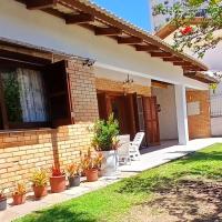 Casa ÍSIS de aluguel por temporada em Capão da Canoa com piscina - Chambres d'hôtes Capão da Canoa