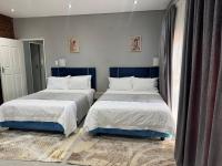 Camera Deluxe Matrimoniale/Doppia con Letti Singoli