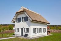 Reetland am Meer - Ihre Superior Reetdachvilla E28 - Zwei Schlafzimmer, Kamin & pure Wohlfühlatmosphäre - B&B Dranske