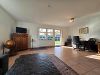 Ferienhaus Dat Steenhuus - Ferienwohnung Marienhafe