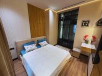 One-Bedroom Apartment with Balcony and City View