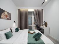 Deluxe One-Bedroom Apartment with City View