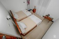 Chambre Triple - Vue sur Jardin