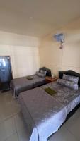 Tweepersoonskamer met 2 Aparte Bedden