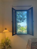 Tranquil Poolside apartment with stunning views - B&B Mazotós