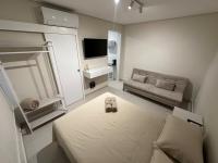 Apartamento com saída para praia - B&B Santos