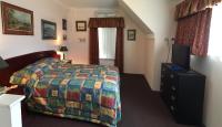 Kamer met Queensize Bed en Eigen Badkamer