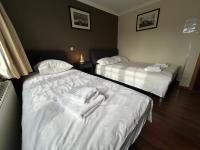 Dreibettzimmer mit eigenem Bad