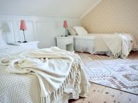 Tweepersoonskamer met 1 of 2 Bedden en Uitzicht op het Meer.