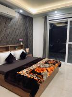 Luxury 2bhk White lotus apartment by Madanan - Chambres d’hôtes Rishīkesh