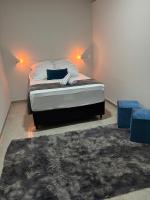 Apto Luxo Centro de Bandeirantes PR - Ar Condicionado, TV Smart, Frigobar,Wifi e Sacada - B&B Bandeirantes