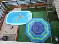 Casa com piscina aquecida e área de festas no litoral - Ferienwohnung Ilhota