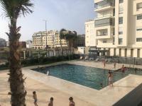 Appartement familial - piscines - stade de foot - B&B Tangeri