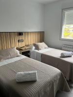 Camera Doppia con Letti Singoli