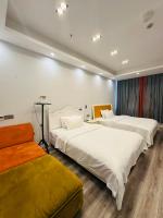 Tweepersoonskamer met 2 Aparte Bedden en Badkamer