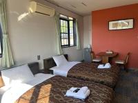 Chambre Lits Jumeaux - Non-Fumeurs