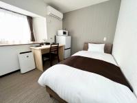 Camera Singola con Bagno in Comune