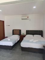 Chambre Deluxe (2 Adultes + 1 Enfant)