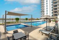 Luxury 1BR on Yas island with Pool & Balcony minutes away from F1 & Parks - Chambres d'hôtes Abou Dabi