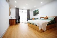 One-Bedroom Apartment with Balcony and City View