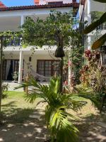 Casa aconchegante em condomínio arborizado - Chambres d’hôtes Pipa