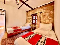 Vierpersoonskamer met Uitzicht op de Tuin.