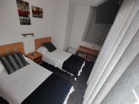 Habitación Doble con baño privado - 2 camas