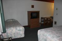 Tweepersoonskamer met 2 Aparte Bedden en een Extra Bed