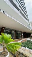 Apartamento Guarujá, com sacada vista mar! Pé na areia, Lindo! - Chambres d'hôtes Guarujá