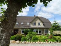 Bei Schütts - Spiel und Spaß im Garten rund um eine moderne Ferienwohnung - B&B Janneby